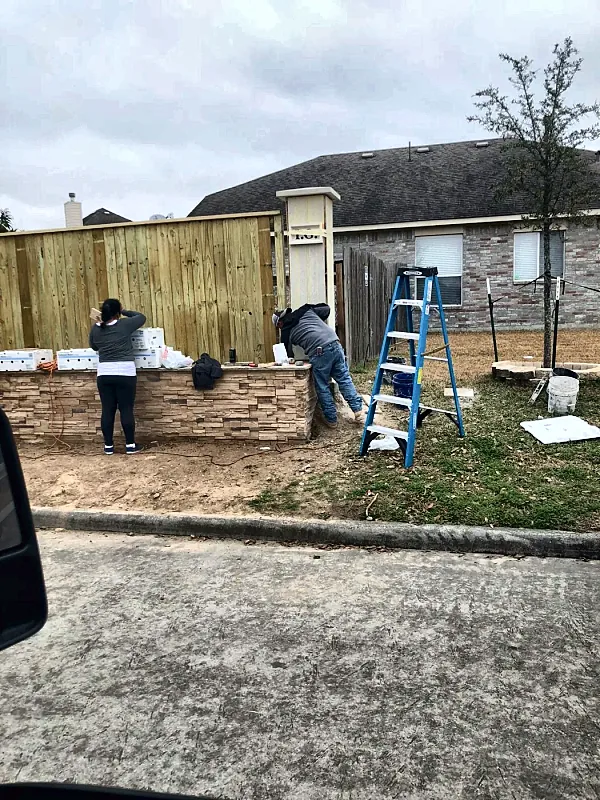 Stone wall construction by Brown Sterling Builders