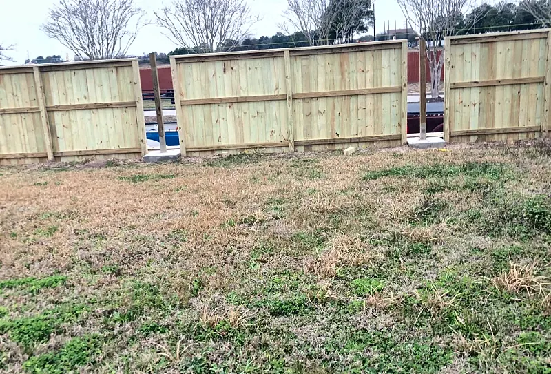 New wood privacy fence built by Brown Sterling Builders