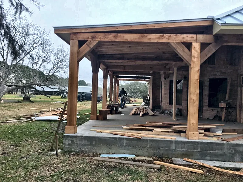 Cedar covered porch built by Brown Sterling Builders in Spring Branch, TX